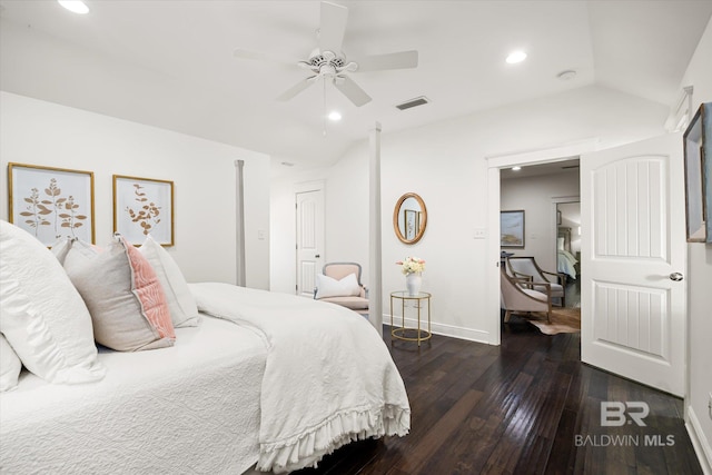 bedroom with ceiling fan and dark wood-type flooring