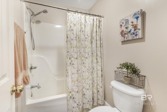 bathroom featuring shower / bath combination with curtain and toilet