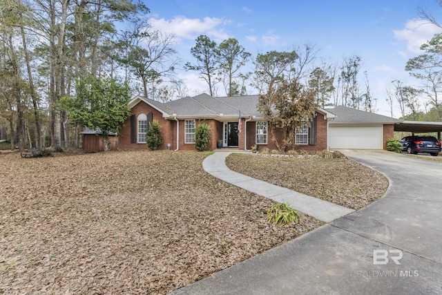 single story home with a carport and a garage