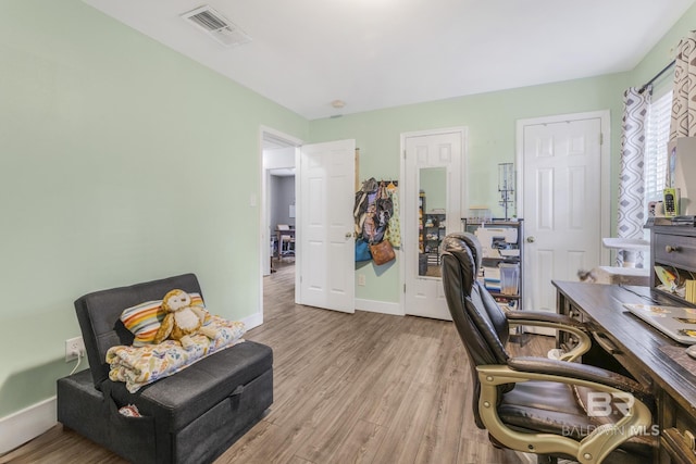 home office featuring light wood-type flooring