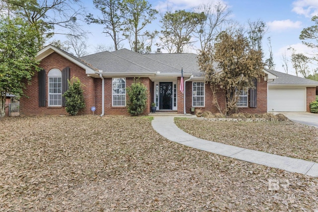 single story home with a garage