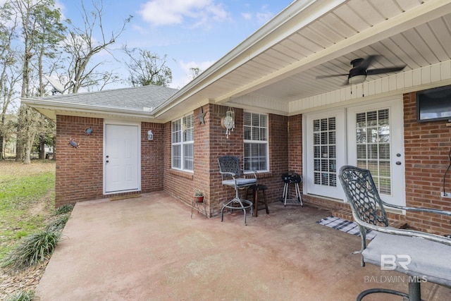 view of patio featuring ceiling fan