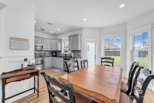 8847 Asphodel Ln, Daphne, AL 36526 - dining space featuring light wood-style floors and recessed lighting
