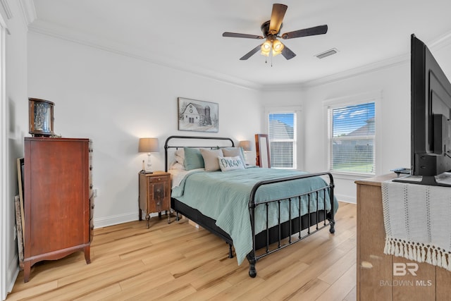 8847 Asphodel Ln, Daphne, AL 36526 - bedroom featuring crown molding, light wood-style floors, baseboards, and ceiling fan