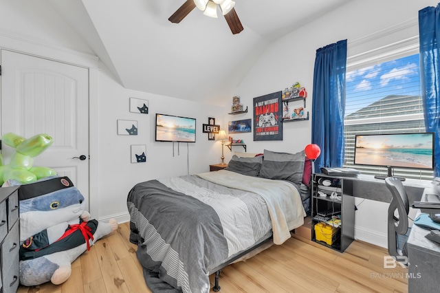 8847 Asphodel Ln, Daphne, AL 36526 - bedroom featuring vaulted ceiling, wood finished floors, and a ceiling fan