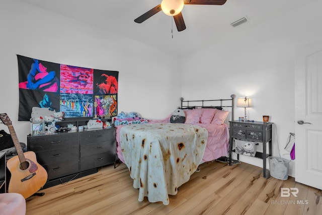 8847 Asphodel Ln, Daphne, AL 36526 - bedroom featuring wood finished floors and ceiling fan