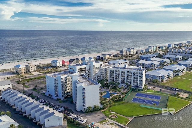 aerial view featuring a view of the beach and a water view