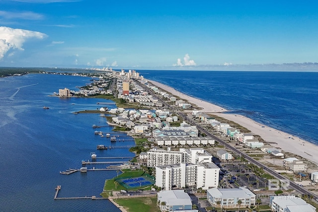 bird's eye view with a beach view and a water view