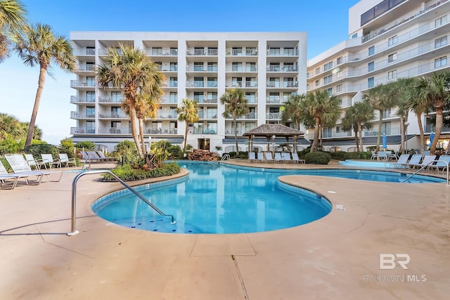 view of pool with a gazebo and a patio