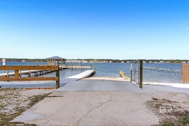 dock area with a water view