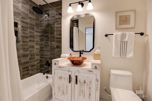 full bathroom featuring shower / bath combination with curtain, toilet, and vanity