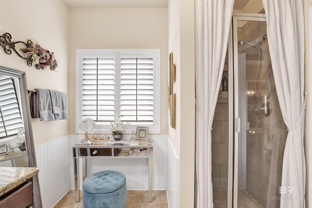 4268 Birkdale St, Gulf Shores, AL 36542 - full bathroom featuring a shower stall, vanity, and wainscoting