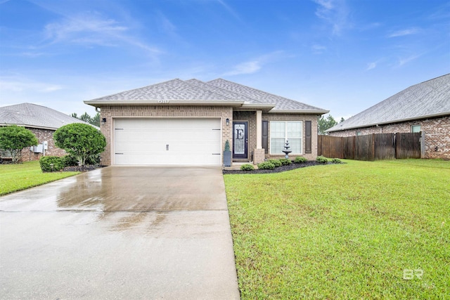 4268 Birkdale St, Gulf Shores, AL 36542 - single story home with brick siding, a garage, concrete driveway, and roof with shingles