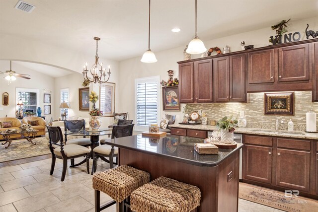 4268 Birkdale St, Gulf Shores, AL 36542 - kitchen featuring a sink, backsplash, plenty of natural light, and recessed lighting