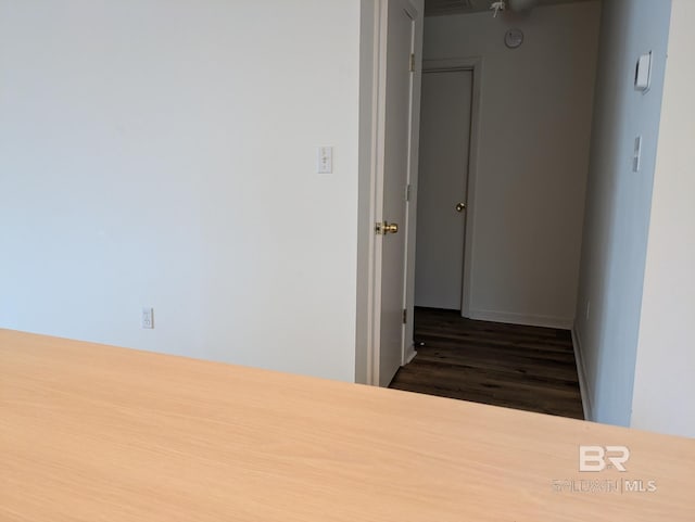 hall featuring wood finished floors
