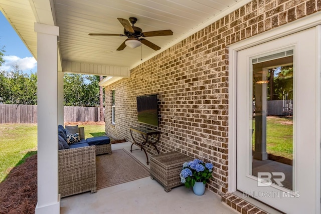 7339 Grissom Dr, Saraland, AL 36571 - view of patio / terrace featuring a ceiling fan, fence, and outdoor lounge area
