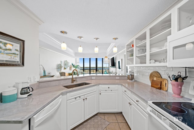 kitchen featuring white cabinetry, sink, crown molding, white appliances, and decorative light fixtures