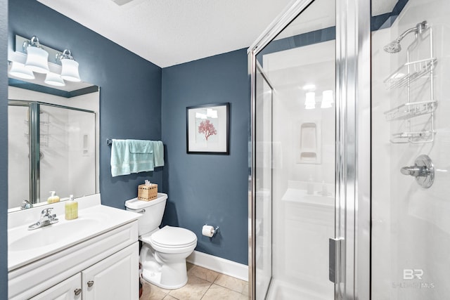 bathroom with walk in shower, tile patterned flooring, a textured ceiling, toilet, and vanity