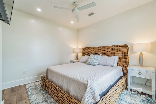1050 W Beach Blvd Unit E, Gulf Shores, AL 36542 - bedroom featuring recessed lighting, a ceiling fan, and wood finished floors