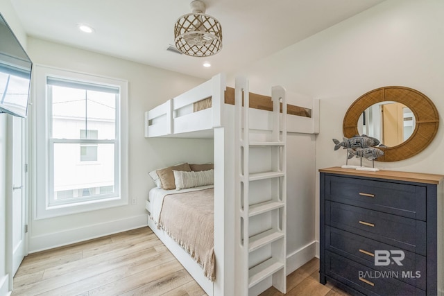 1050 W Beach Blvd Unit E, Gulf Shores, AL 36542 - bedroom featuring light wood-style floors and recessed lighting