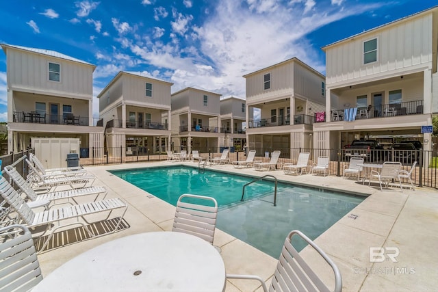 1050 W Beach Blvd Unit E, Gulf Shores, AL 36542 - community pool with a patio area