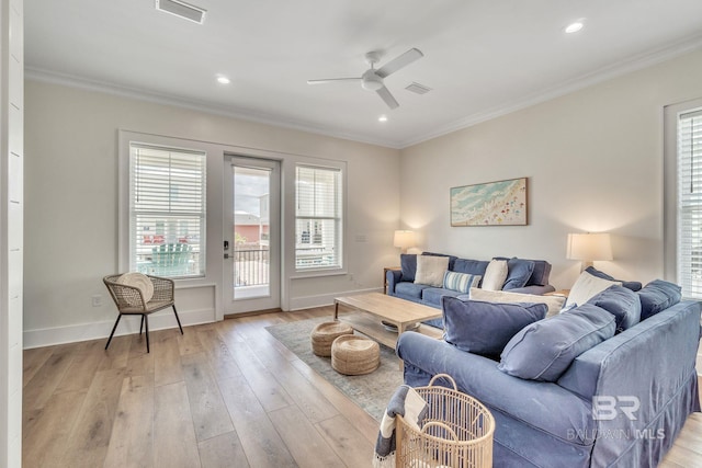 1050 W Beach Blvd Unit E, Gulf Shores, AL 36542 - living room featuring a ceiling fan, ornamental molding, light wood-style floors, and recessed lighting