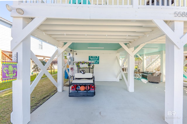 view of patio / terrace with an attached carport