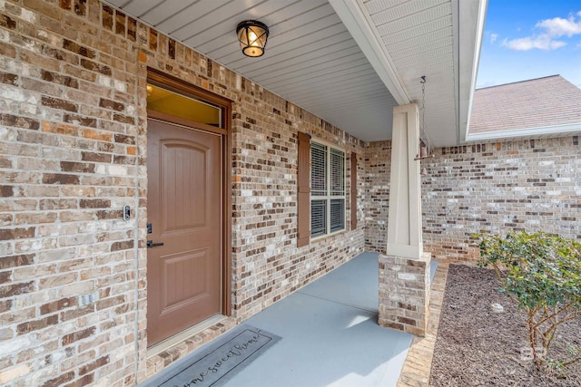 doorway to property with covered porch