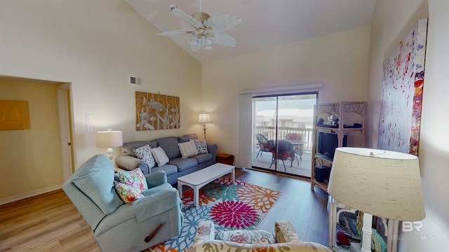 28835 Perdido Beach Blvd Unit 309, Orange Beach, AL 36561 - living area with wood finished floors, a ceiling fan, and high vaulted ceiling