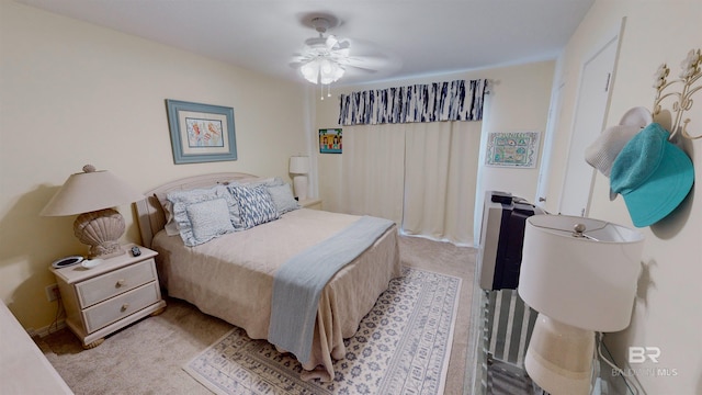 28835 Perdido Beach Blvd Unit 309, Orange Beach, AL 36561 - bedroom with light colored carpet and ceiling fan