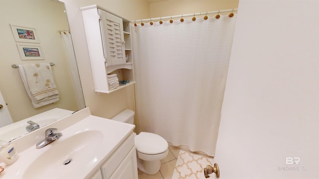 28835 Perdido Beach Blvd Unit 309, Orange Beach, AL 36561 - bathroom featuring toilet, tile patterned flooring, vanity, and a shower with curtain