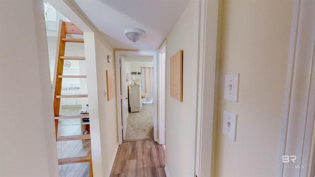 28835 Perdido Beach Blvd Unit 309, Orange Beach, AL 36561 - corridor featuring light wood finished floors and baseboards