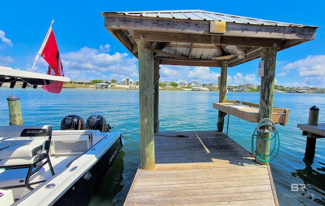 28835 Perdido Beach Blvd Unit 309, Orange Beach, AL 36561 - dock featuring a water view and a gazebo