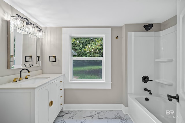 1716 Bryan Ave, Mobile, AL 36605 - full bath featuring baseboards, marble finish flooring, vanity,  shower combination, and a chandelier