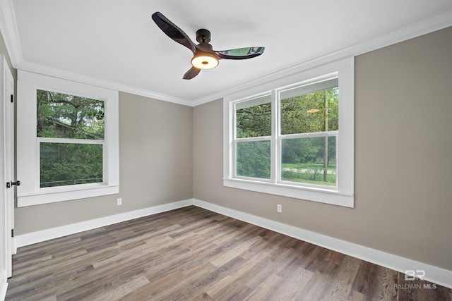 1716 Bryan Ave, Mobile, AL 36605 - unfurnished room with plenty of natural light, ornamental molding, wood finished floors, baseboards, and a ceiling fan