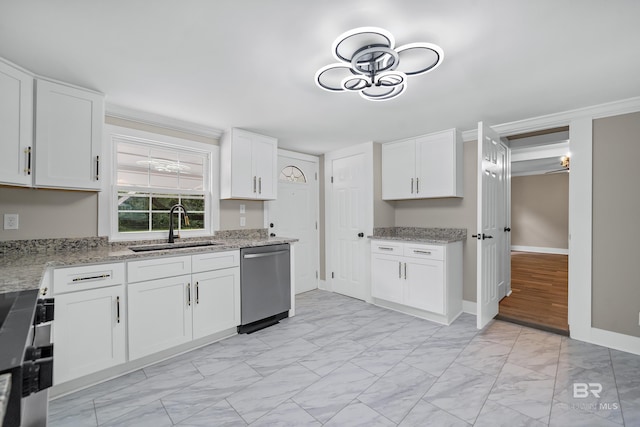 1716 Bryan Ave, Mobile, AL 36605 - kitchen featuring dishwasher, a sink, light marble finish floors, white cabinetry, and baseboards