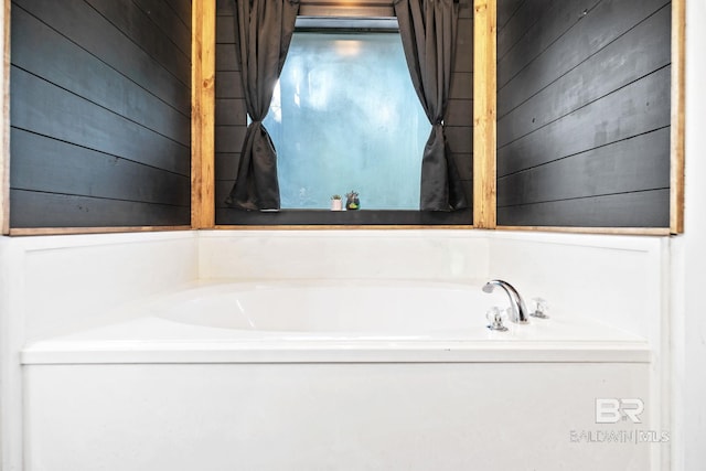 bathroom featuring a tub