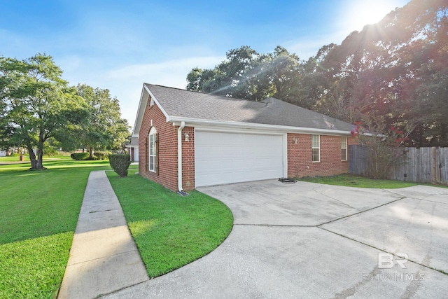 view of property exterior with a yard and a garage