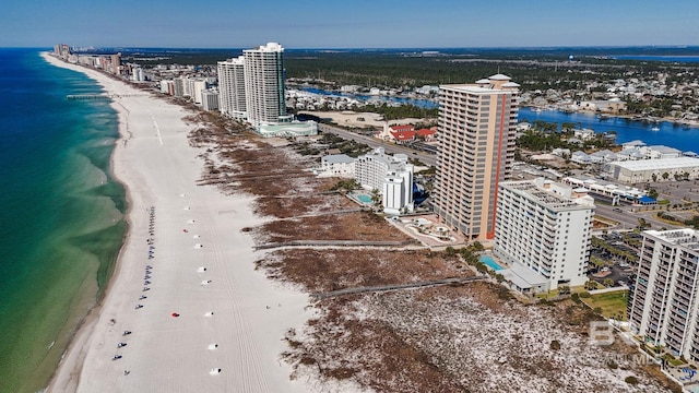 bird's eye view featuring a view of city, a water view, and a view of the beach