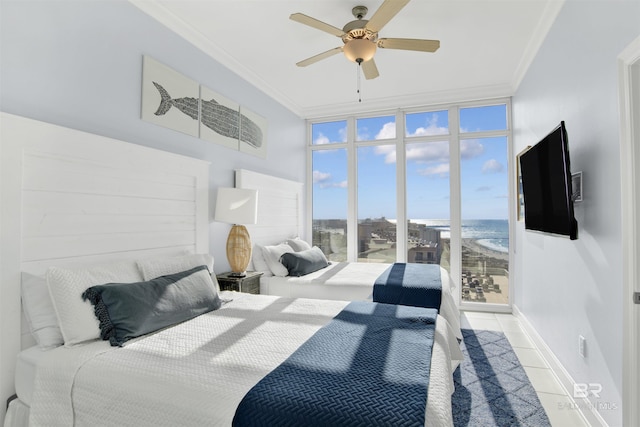 bedroom with ornamental molding, tile patterned floors, ceiling fan, and floor to ceiling windows