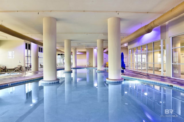 indoor community pool with decorative columns
