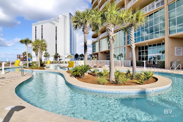 community pool with a patio