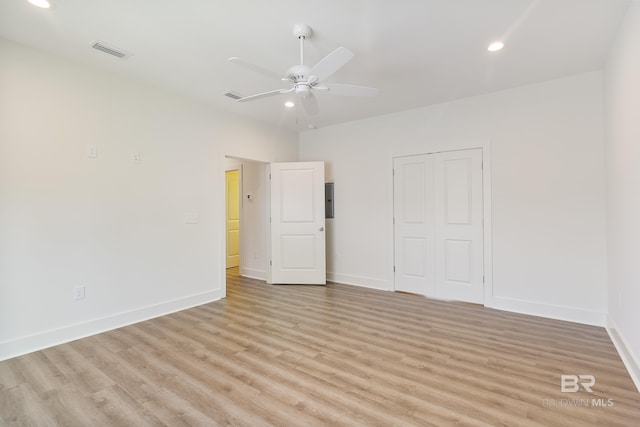 9264 Brighton Ave, Elberta, AL 36530 - unfurnished bedroom featuring light wood-type flooring, baseboards, a closet, recessed lighting, and electric panel