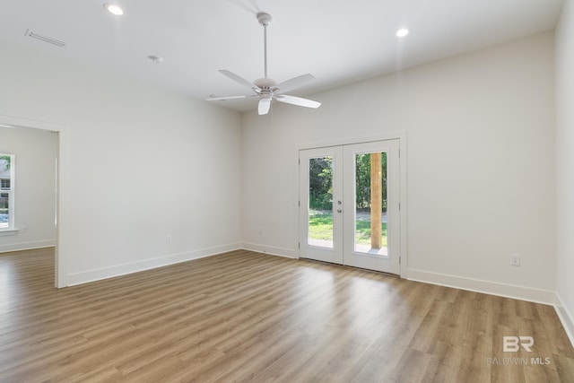 9264 Brighton Ave, Elberta, AL 36530 - unfurnished room with french doors, light wood-style floors, baseboards, a ceiling fan, and recessed lighting