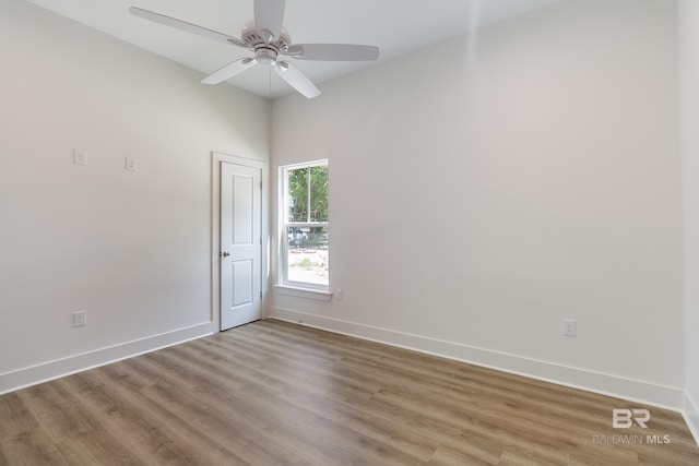 9264 Brighton Ave, Elberta, AL 36530 - spare room with baseboards, light wood-type flooring, and ceiling fan