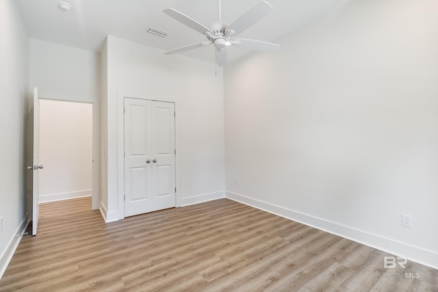 9264 Brighton Ave, Elberta, AL 36530 - empty room featuring a ceiling fan, light wood-style floors, baseboards, and a smoke detector