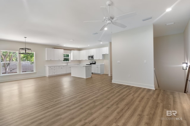 9264 Brighton Ave, Elberta, AL 36530 - unfurnished living room with ceiling fan, light wood-style flooring, recessed lighting, and baseboards
