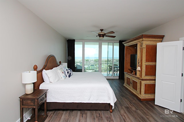 bedroom featuring ceiling fan, expansive windows, access to outside, and dark wood-type flooring