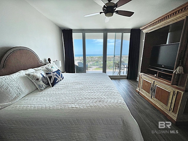 bedroom featuring floor to ceiling windows, dark hardwood / wood-style floors, ceiling fan, and access to outside