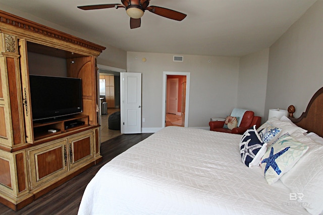 bedroom with dark wood-type flooring and ceiling fan